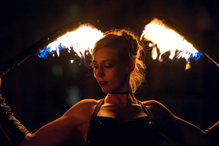 Fire spinner Ember Flynne performs at WaterFire. Photograph by Kevin Murray.