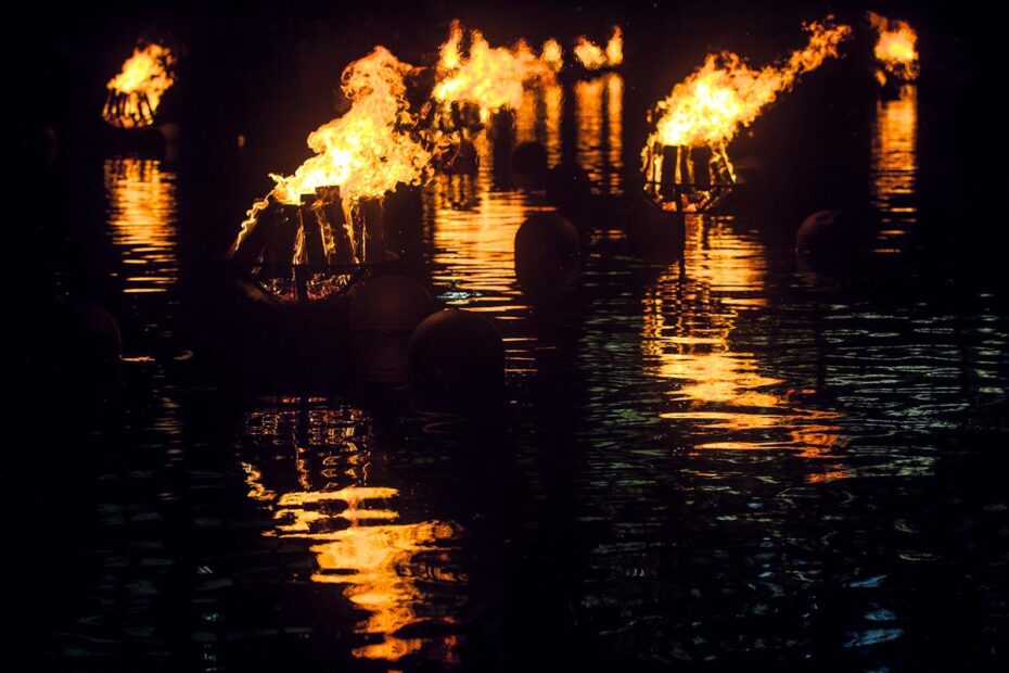 Burning braziers, at WaterFire in Providence, Rhode Island. Photograph by Erin Cuddigan.