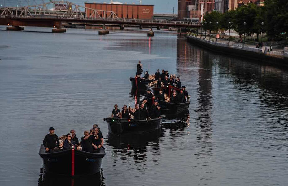 Light boat procession lining up at WaterFire in 2019. Photograph by Luis Andrade.