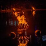 Braziers burning in Waterplace Basin. Photograph by Jeff Meunier.