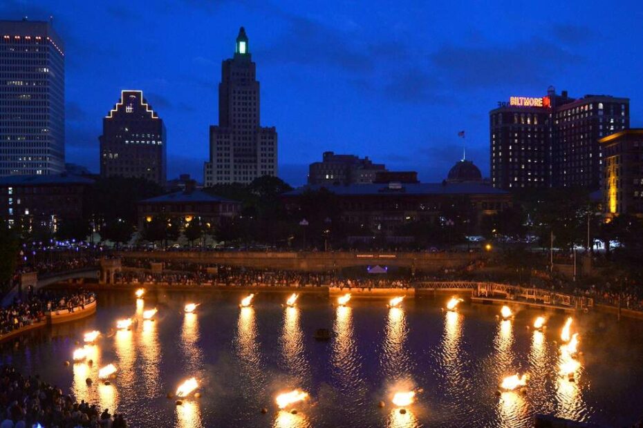 The fires light up Waterplace Basin and the city skyline. Photograph by John Nickerson