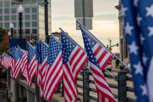 Flags on display along Memorial Boulevard. Photograph by Mia Rietzel.